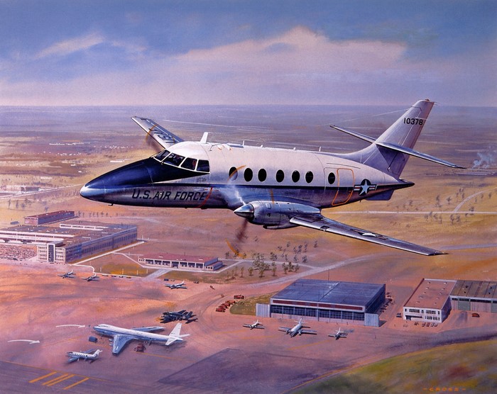 U.S. Air Force aircraft flying over an airfield
