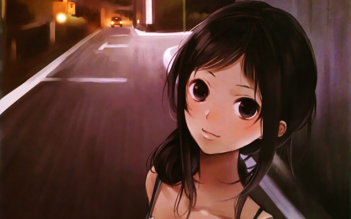 Girl on a street at night