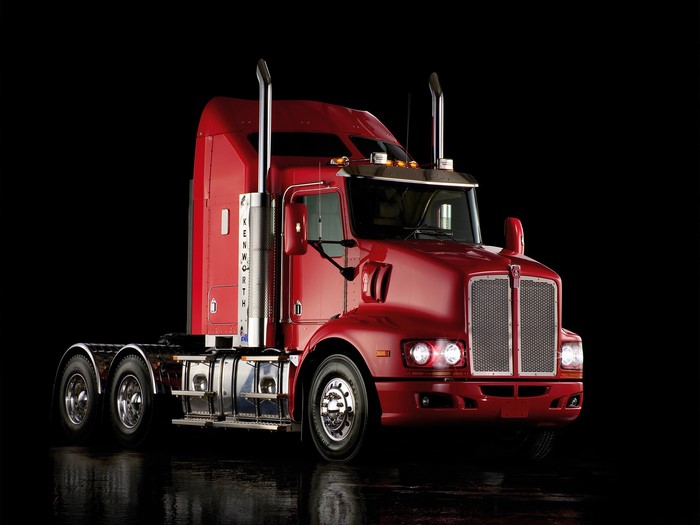 Red Kenworth Semi-Truck on Black Background
