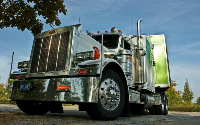 Peterbilt truck with green trailer