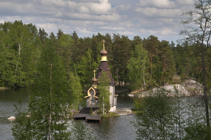 Wooden church on a small island in a lake