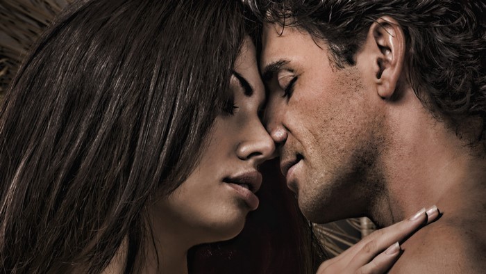 Couple embracing intimately