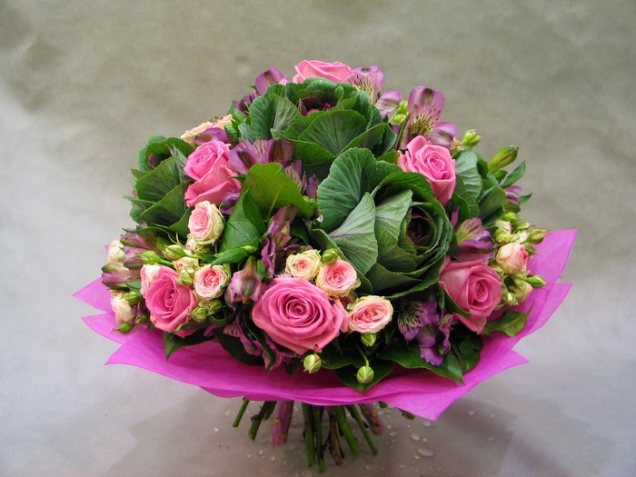 Pink roses and ornamental cabbage bouquet