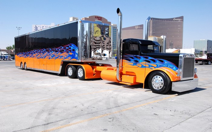 Custom flame-painted semi-truck and trailer