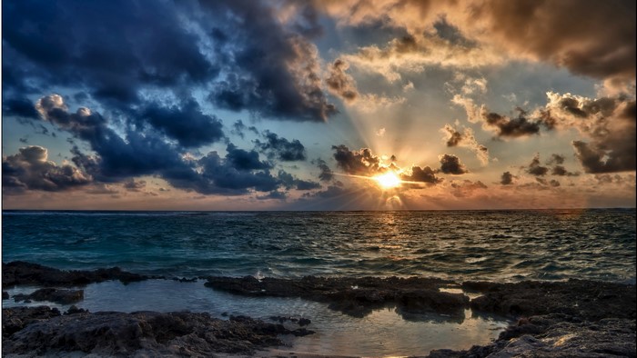 4K Sunrise over the Ocean with Clouds