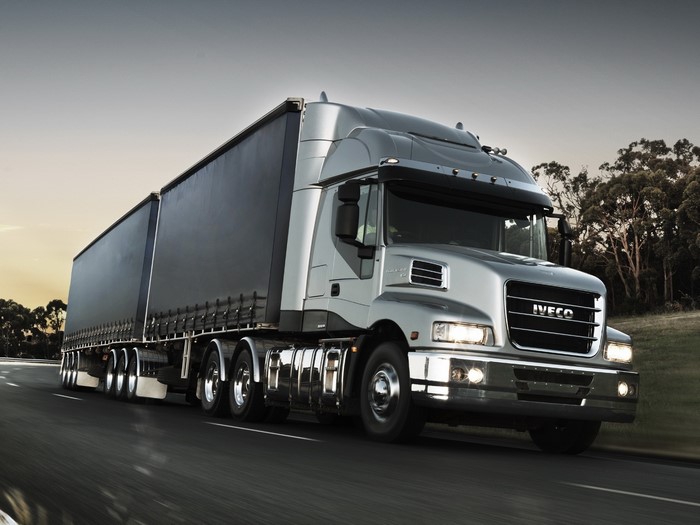 IVECO Truck with Trailer on Road