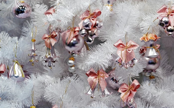 White Christmas tree with pink and silver ornaments