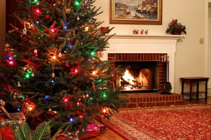 Christmas tree with lights and fireplace