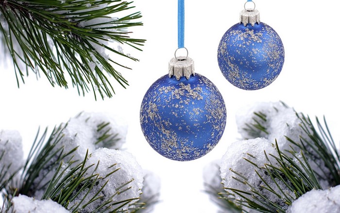 Blue Christmas Ornaments on Snowy Pine Branches