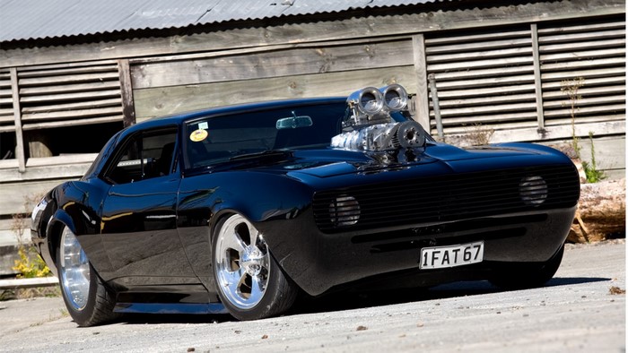 Black 1967 Chevrolet Camaro with supercharger