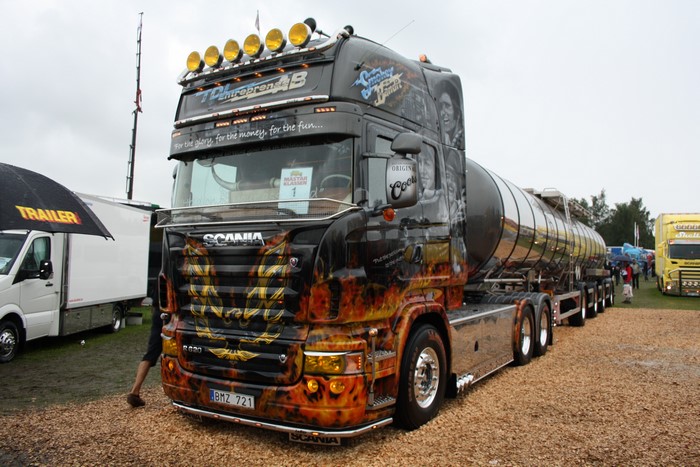 Custom Scania tanker truck with flame graphics
