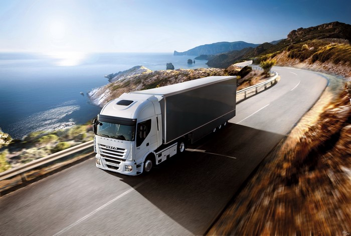 IVECO truck driving on a coastal road