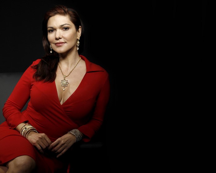 Laura Harring in a red dress