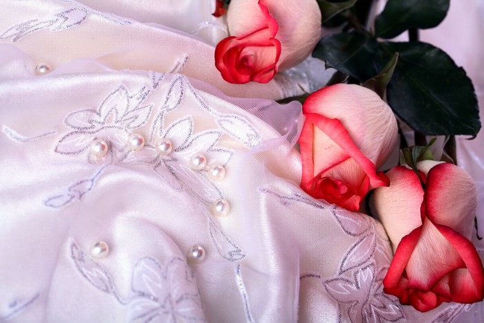 White fabric with roses and pearls