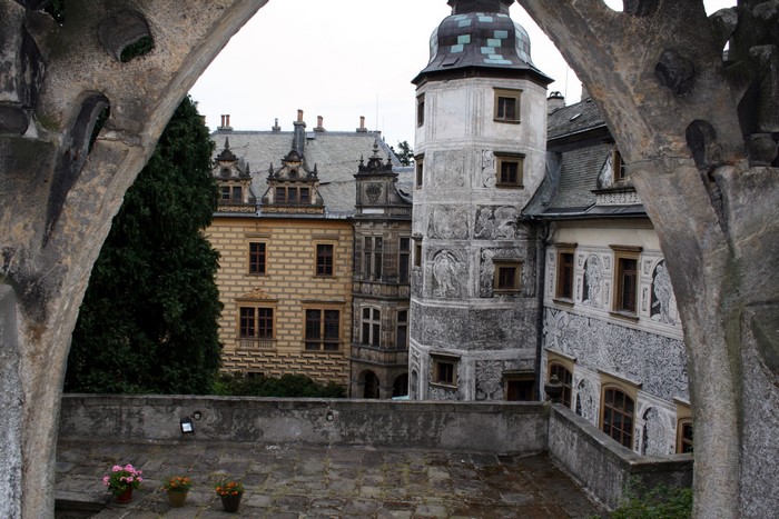 Castle with ornate tower and courtyard