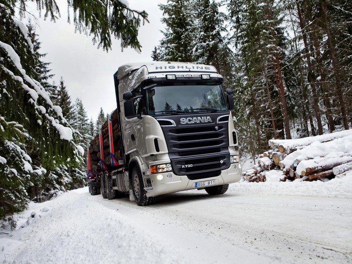 Scania R730 logging truck in winter forest