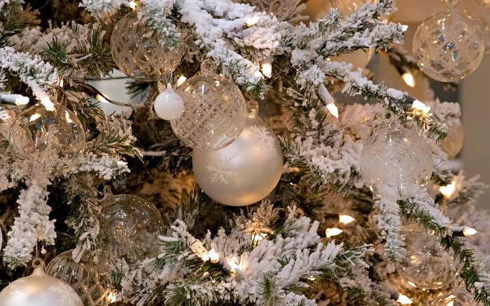 Christmas tree with white ornaments and lights