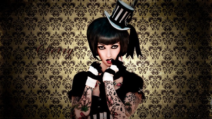 Woman with tattoos and top hat