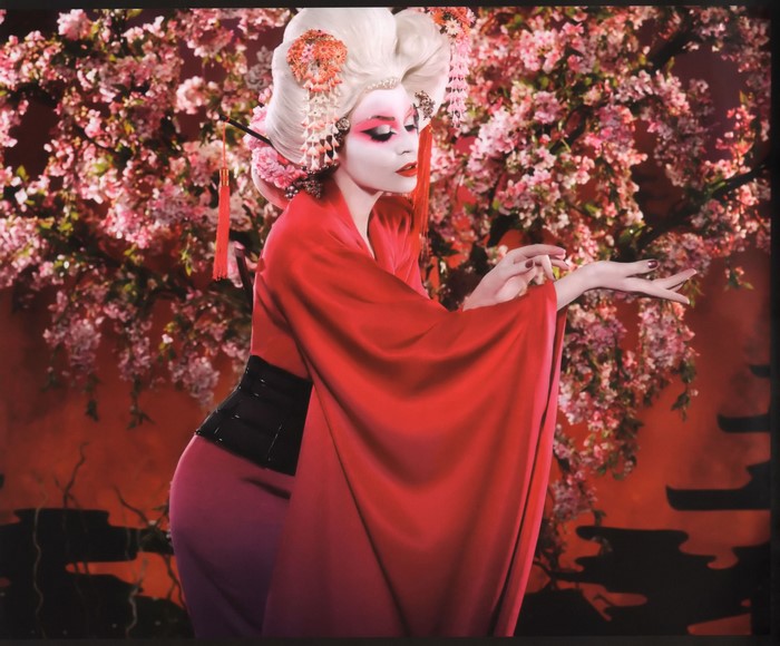 Kylie Minogue in a red kimono with cherry blossoms