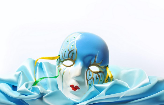Blue and white Venetian mask with ribbons