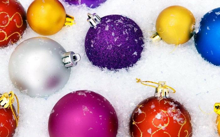 Christmas ornaments in snow