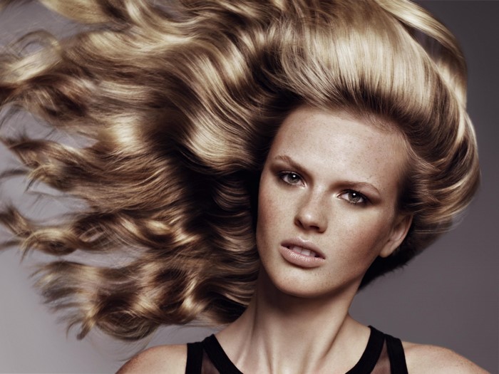 Anne Vyalitsyna with flowing blonde hair