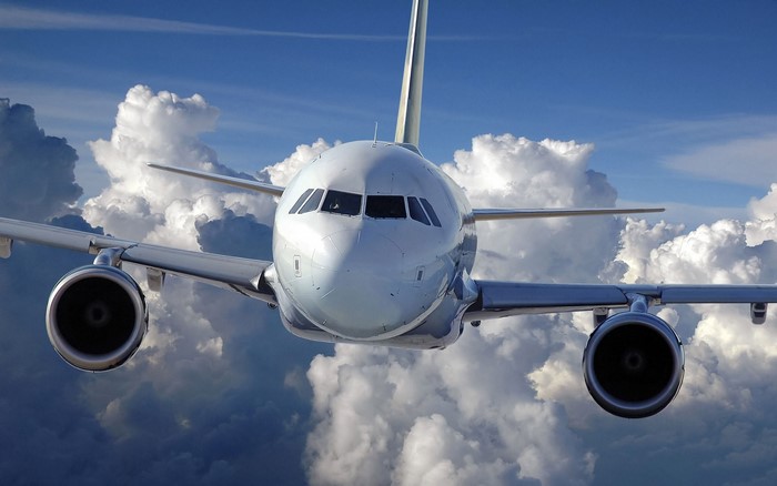 Airplane flying through clouds