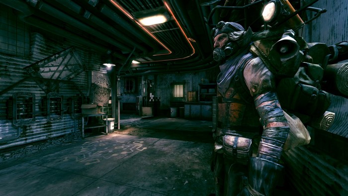 Man with gas mask and backpack in industrial setting