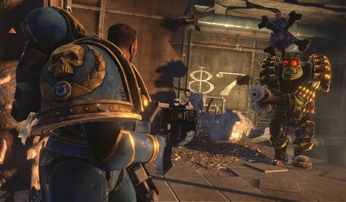 Space Marine and Ork from Warhammer 40000