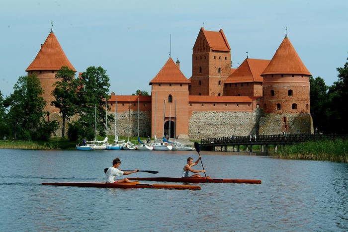 Trakai Island Castle on a lake with kayakers