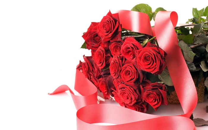 Bouquet of red roses with a red ribbon