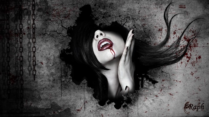 Vampire woman with blood dripping from her mouth