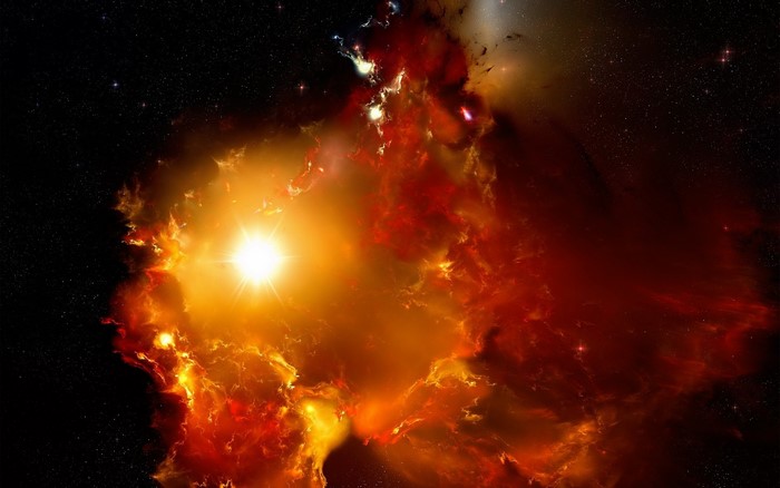 Bright star illuminating a red and orange nebula in space