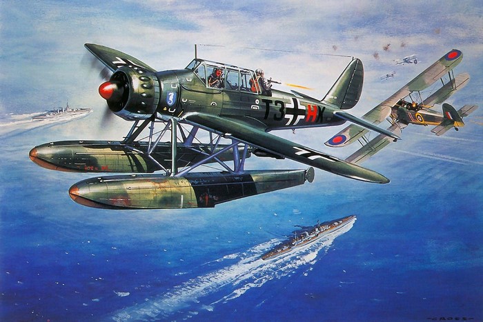 WWII floatplane attacking a submarine with biplanes in the background