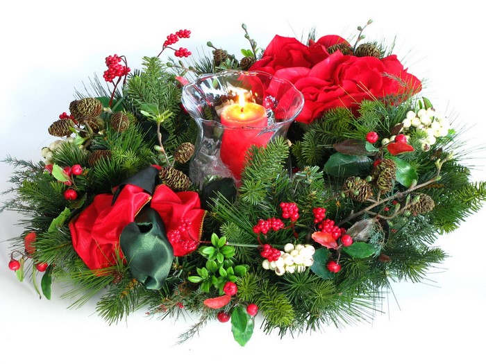 Christmas centerpiece with candle and pine branches