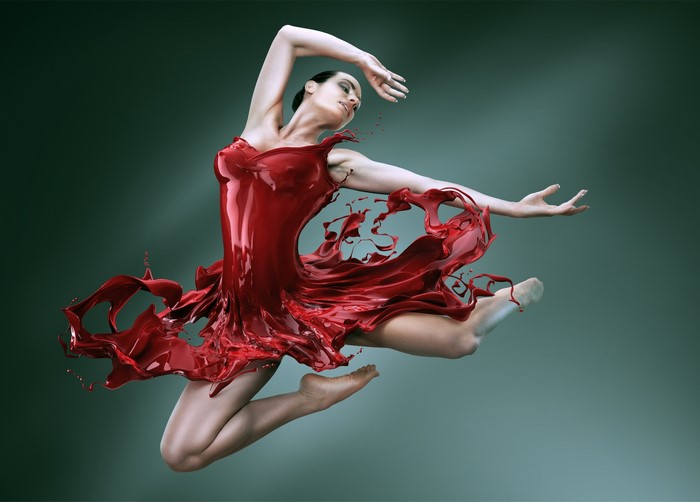 Dancer in a red liquid dress