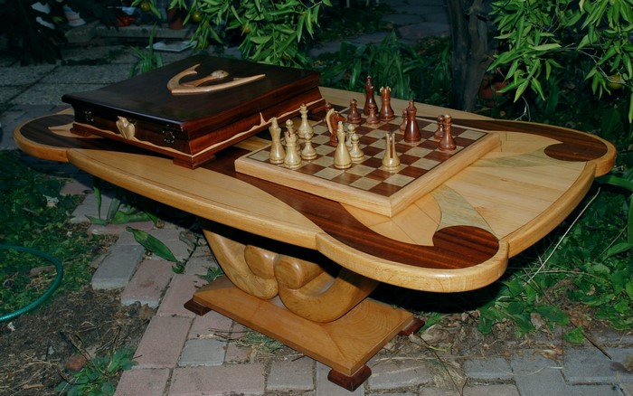 Wooden chess set on a decorative table
