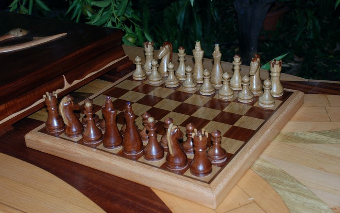 Wooden Chess Set on a Decorative Table