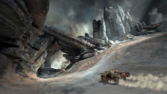A buggy drives through a rocky, desolate landscape under a stormy sky.