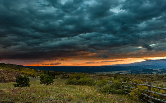 Stormy Sunset Over a Rural Landscape