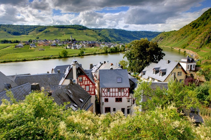 Village on a river with vineyards in Germany