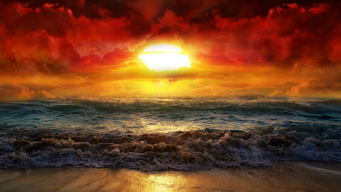 Sunset over the ocean with dramatic clouds
