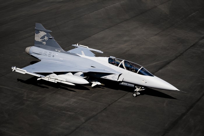 Saab JAS 39 Gripen fighter jet on tarmac