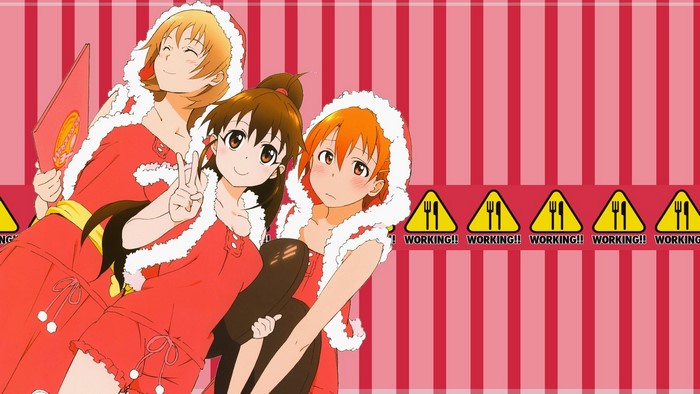 Three anime girls in Santa outfits