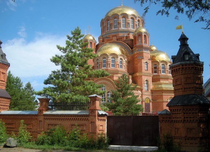 Brick Orthodox Church with Golden Domes