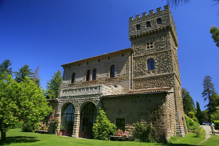 Stone castle with tower in Tuscany, Italy