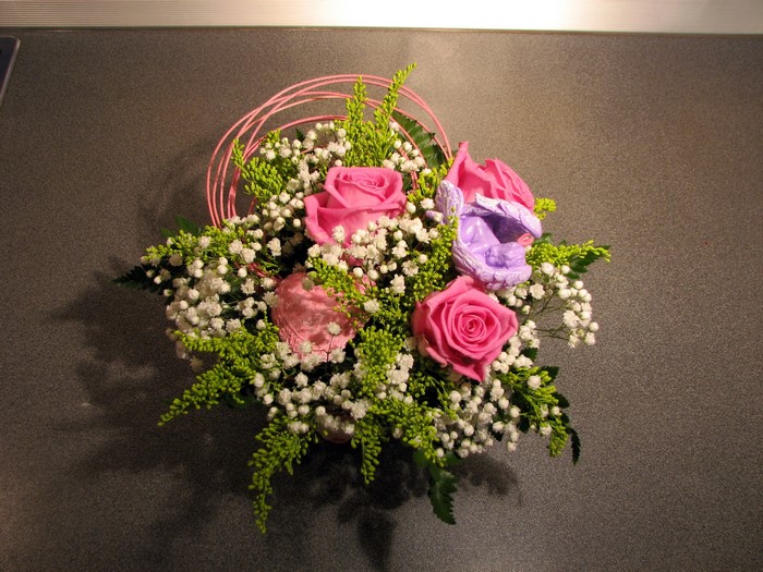 Pink roses and baby's breath floral arrangement