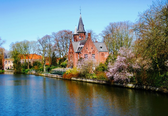 Canal and historic building in Bruges, Belgium