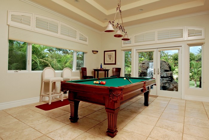 Interior of a billiards room with a pool table