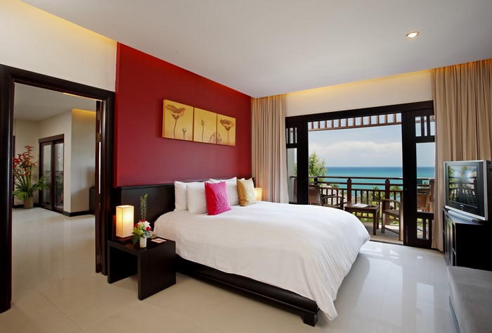 Bedroom with ocean view balcony